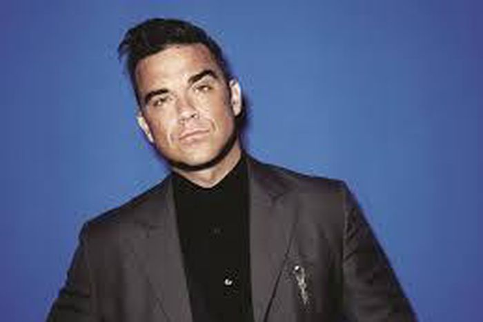 Pop singer turns auctioneer, raises $226,000 for charity