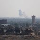 Smoke rises in Egypt's North Sinai as seen from the border of southern Gaza Strip with Egypt July 1, 2015. REUTERS/Ibraheem Abu Mustafa