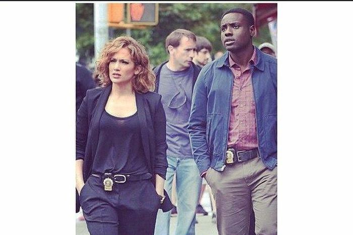 Jennifer Lopez filming a scene with Nigerian American actor, Dayo Okeniyi. 