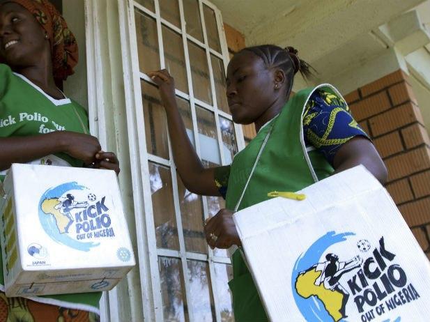 Health officials go from house to house to immunise children against polio.