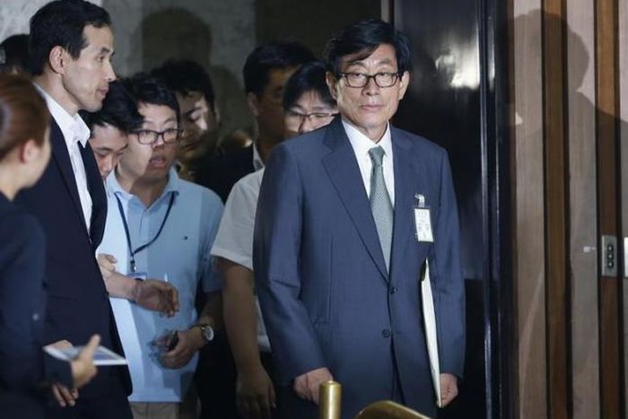 South Korea court orders retrial of ex-spy chief in vote-meddling case