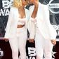 Amber Rose and Blac Chyna share a kiss at the 2015 BET Awards