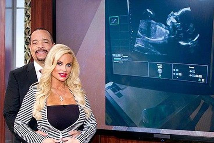 Ice T and wife, Coco photographed with their daughter's sonogram