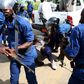 A detained protestor lies on the ground during a protest in Buterere neighbourhood of Bujumbura, Burundi May 12, 2015.   REUTERS/Goran Tomasevic