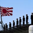 China says Japan defence review misleading, Japan releases photos