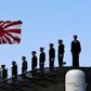 China says Japan defence review misleading, Japan releases photos