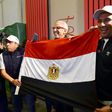 Egyptian representatives celebrate in Dakar after the Confederation of African Football (CAF) executive committee's decision to choose Egypt to host the 2019 Africa Cup of Nations