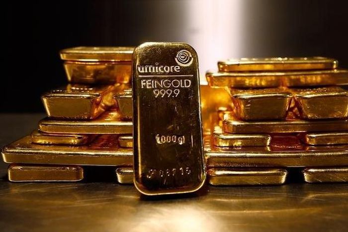 Gold bars are stacked in the safe deposit boxes room of the Pro Aurum gold house in Munich March 3, 2014. REUTERS/Michael Dalder