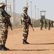 Algerian soldiers are seen at the Tiguentourine Gas Plant in In Amenas, 1600 km (994 miles) southeast of Algiers, January 31, 2013. REUTERS/Louafi Larbi