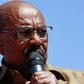 Sudanese President Omar al-Bashir addresses his supporters during a rally in the capital Khartoum on January 9, 2019