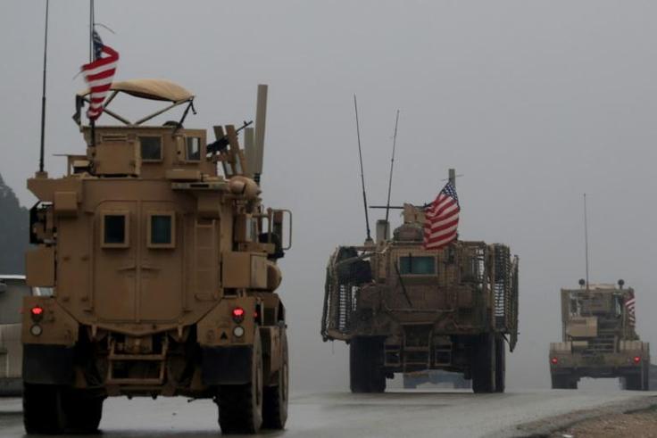 A line of US military vehicles in Syria's northern city of Manbij on December 30, 2018