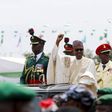 Nigeria's new President Muhammadu Buhari rides on the motorcade while inspecting the guard of honour at Eagle Square in Abuja, Nigeria May 29, 2015. REUTERS/Afolabi Sotunde