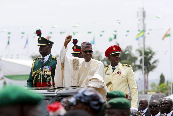 Nigeria's new President Muhammadu Buhari rides on the motorcade while inspecting the guard of honour at Eagle Square in Abuja, Nigeria May 29, 2015. REUTERS/Afolabi Sotunde
