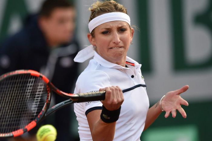 Timea Bacsinszky stuns Petra Kvitova to reach last eight