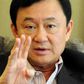 Thailand revokes passports of ousted former PM Thaksin