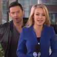 Hugh Jackman photo-bombing a news reporter