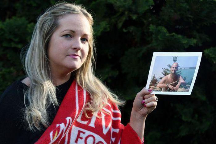 Caroline Waine of Woolton. Caroline had to withdraw from the Echo Win a Wedding Competition after the death of her fiancé, Stuart Murphy, from cancer. Pictured here with his Liverpool FC blanket and photograph