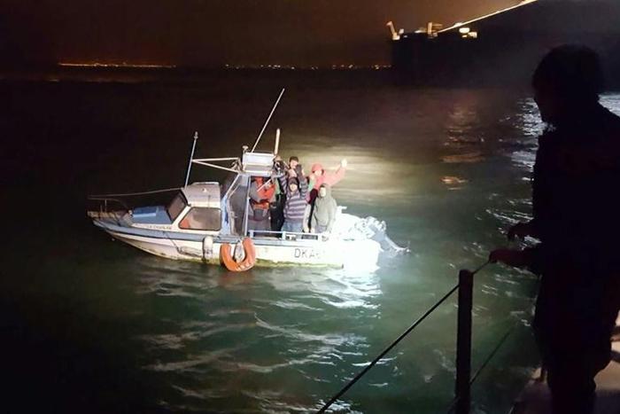 A migrant boat spotted by a French patrol in the Channel, where the number of attempted crossings from France to Britain has surged
