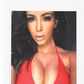 Kim Kardashain spotting a red bikini on the hard cover of the book, Selfish