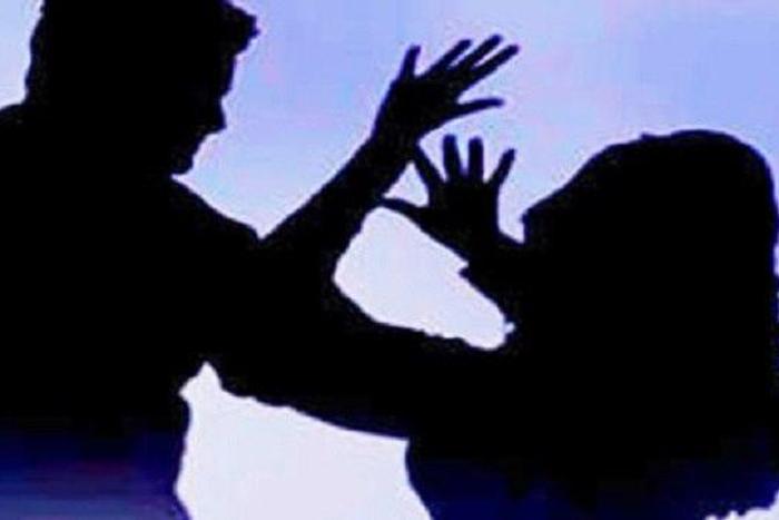Man attacks wife and family over money.