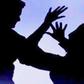 Man attacks wife and family over money.