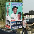 Election time: A campaign poster in Lagos for President Muhammadu Buhari and Vice President Yemi Osinbajo, contending next month's polls
