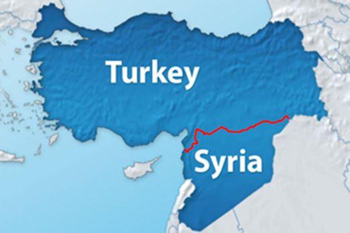 Hundreds of refugees cross back into Syria from Turkey - witnesses