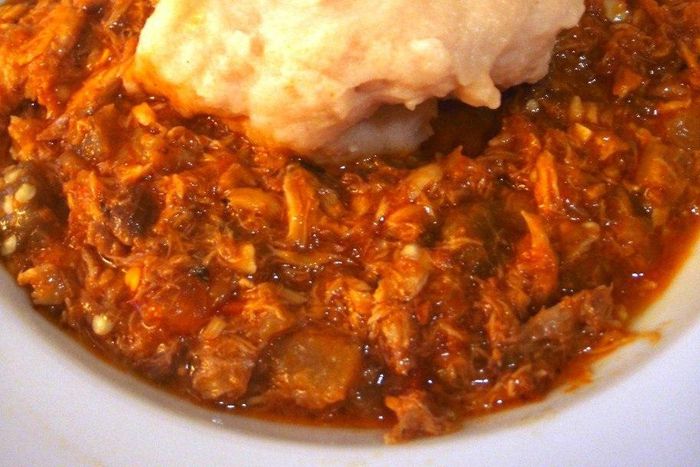 Groundnut stew with smoked fish