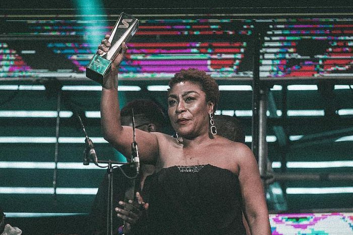 Bose Ogulu represents her son Burna Boy at the Soundcity Awards on Saturday, where she moves the audience with a powerful speech. - AkPraise