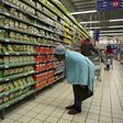 A shopper browses in a branch of South African retailer Pick n Pay at a mall in Soweto, southwest of Johannesburg August 4, 2014. REUTERS/Siphiwe Sibeko