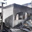 The burnt building with landlord inset.