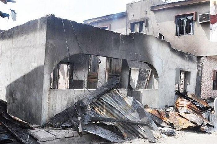 The burnt building with landlord inset.