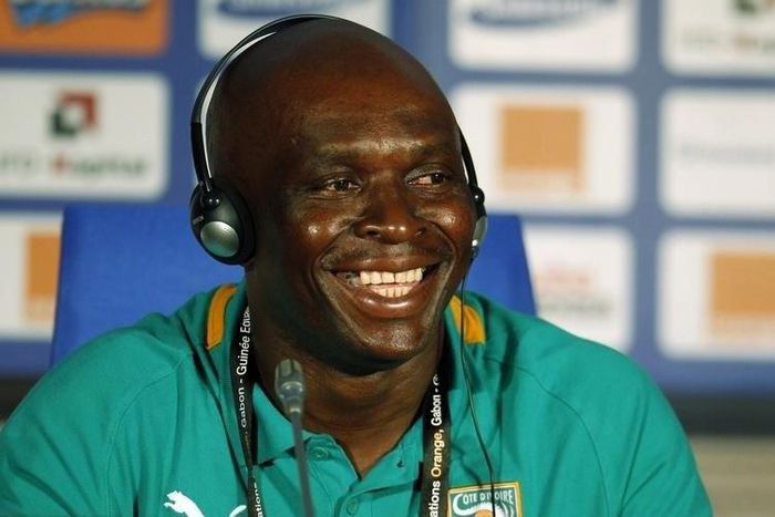 Francois Zahoui smiles during a news conference at the Stade De L'Amitie Stadium in Gabon's capital Libreville, February 7, 2012.  REUTERS/Thomas Mukoya
