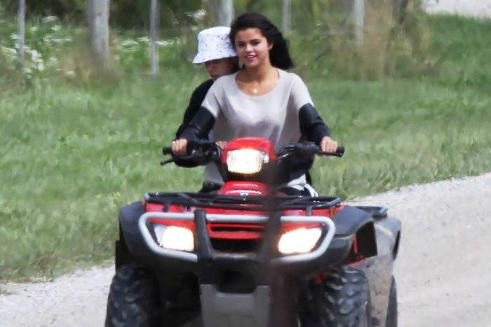 Justin Bieber and Selena Gomez enjoying a ride in Ontario in 2014 Summer
