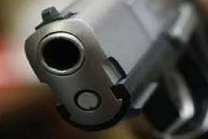 Militant suspect kills father and is shot dead by police