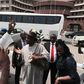 Former Rivers State Governor, Rotimi Amaechi drums at the Eagle Square in Abuja