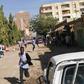 Sudanese protesters run away from tear gas during a demonstration in Khartoum, on December 31, 2018