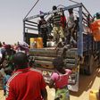 People displaced by the Boko Haram insurgence board a truck to travel back to their home states, after arriving in Nigeria, at Geidam, Nigeria May 6, 2015. REUTERS/Afolabi Sotunde