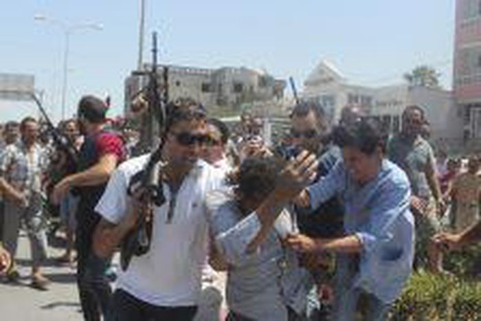 Dutch police fire warning shots during unrest over arrest death