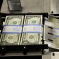 United States one dollar bills are put in packaging bands during production at the Bureau of Engraving and Printing in Washington November 14, 2014.   REUTERS/Gary Cameron