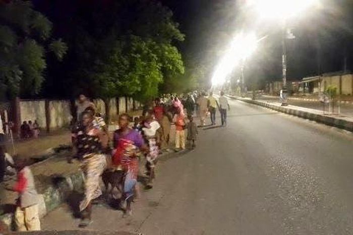 Residents of Maiduguri, Borno State flee a Boko Haram attack on March 13, 2015.