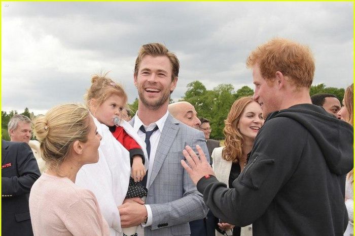 Chris Hemsworth, daughter, wife greet Prince Harry in London