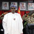 Buhari, left, pictured next to Chief of Army staff Tukur Yusuf Buratai at ceremonies for an annual military conference last November