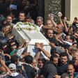 In this file photo taken on November 3, 2018, Coptic Christians carry the coffin of a victim killed in a jihadist attack a day earlier in Egypt's Minya province