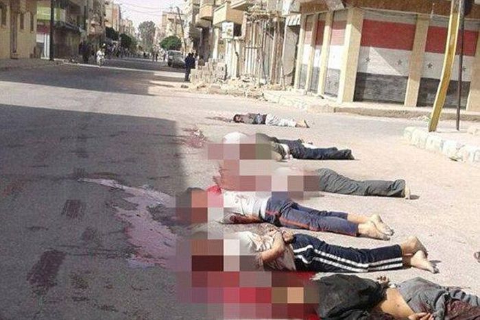 A picture sent by activists to a Western journalist showed a row of men in a street in Palmyra — known locally by its Arabic name Tadmur — lying in a pool of blood. At least four had been decapitated
