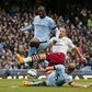 Aston Villa's Ron Vlaar in action with Manchester City's Pablo Zabaleta and Yaya Toure. Action Images via Reuters / Jason Cairnduff