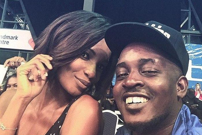 Agbani Darego and M.I at the basketball game