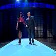 Naomi Campbell shows TV host how to walk the runway