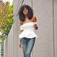Folake Huntoon scores denim with flirty off shoulder top