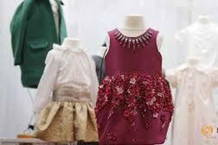 Toddler Harper's designer clothes go on sale for charity